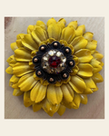 Sunflower With Copper Ruby & Champagne 1" Concho on a warm cream background