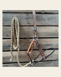 Brown Floral Tooled Lariat & Leather Combo Halter on a warm cream background