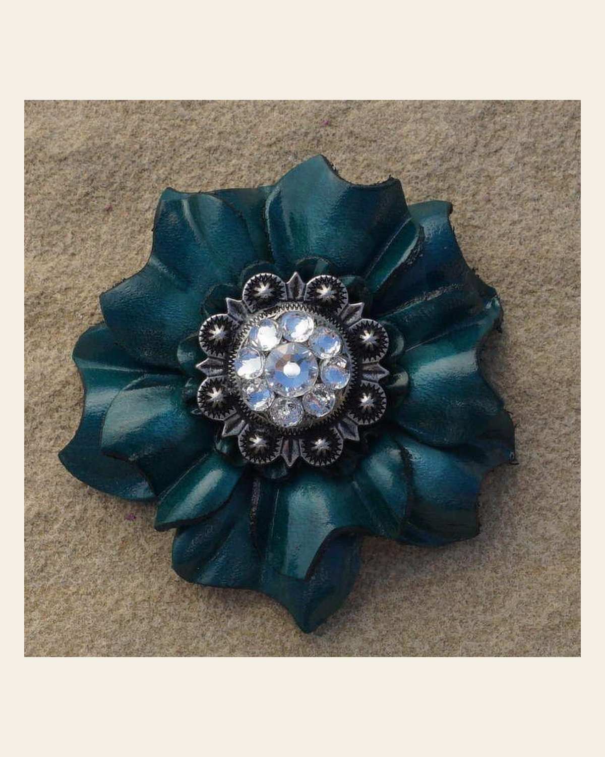 Teal Carnation Flower With Antique Silver Clear 1" Concho on a warm cream background