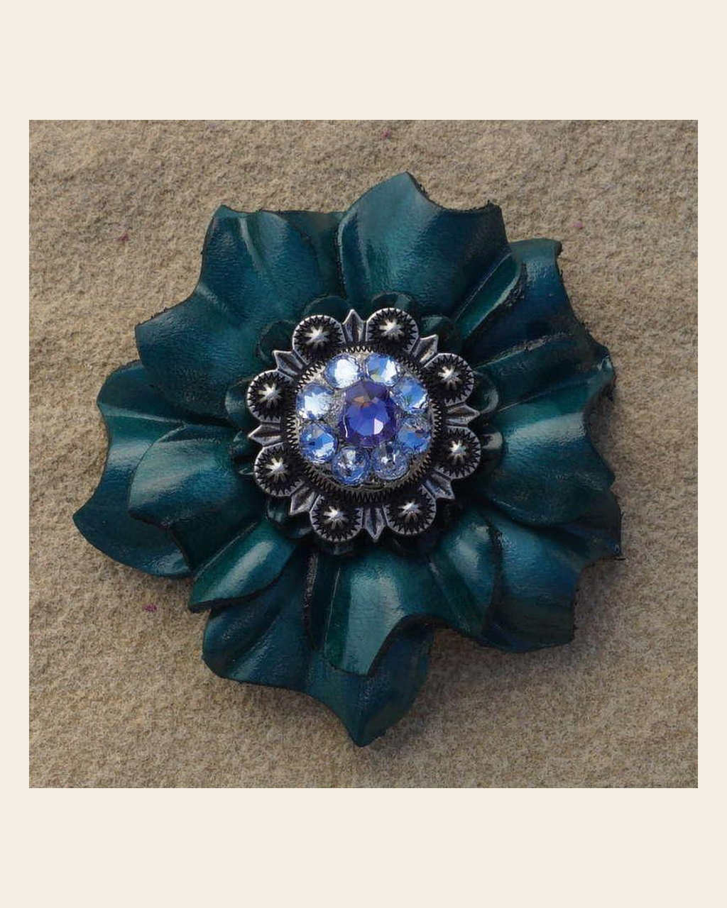 Teal Carnation Flower With Antique Silver Lilac and Light Sapphire 1" Concho on a warm cream background