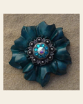 Teal Carnation Flower With Antique Silver Teal & AB 1" Concho on a warm cream background