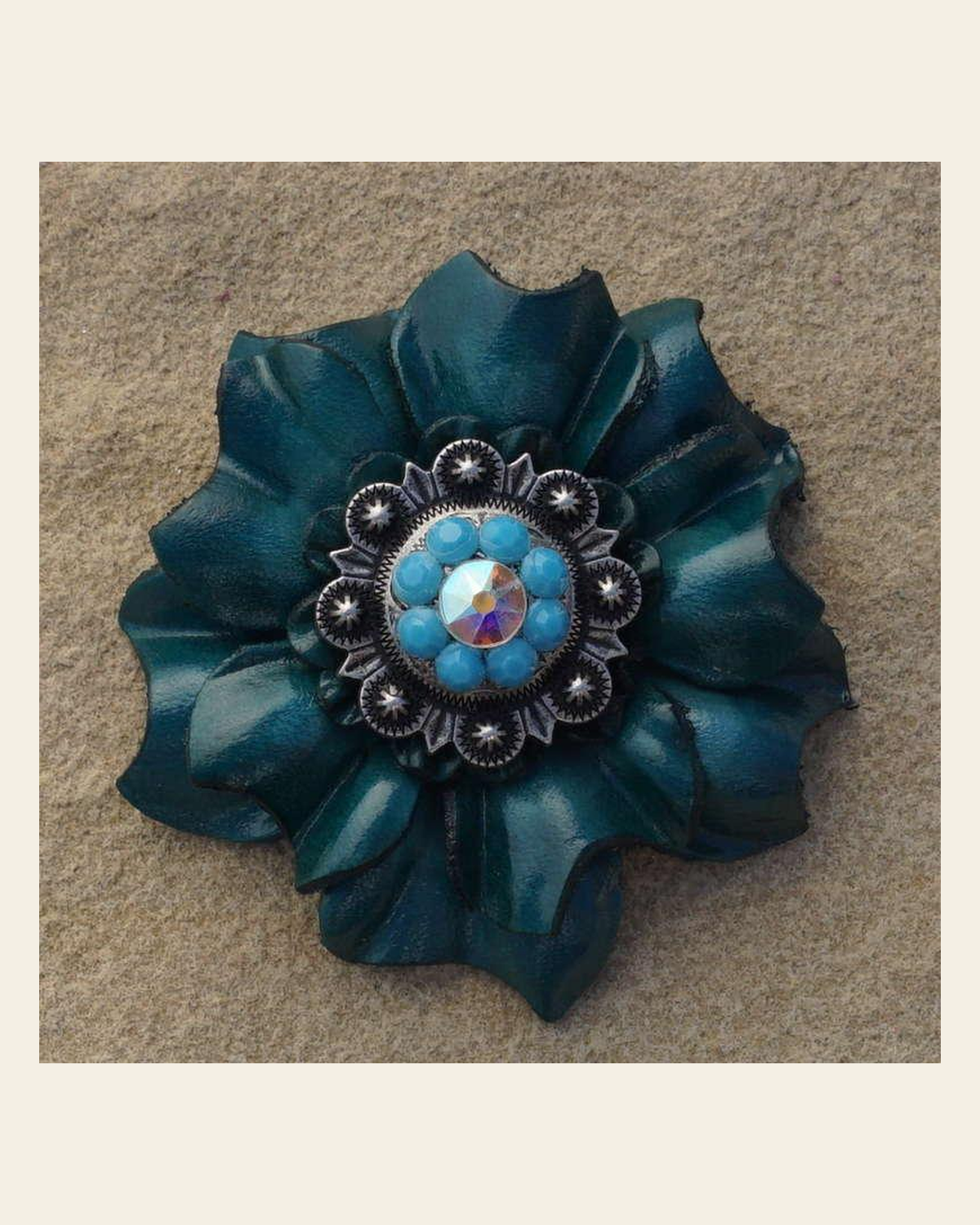 Teal Carnation Flower With Antique Silver Turquoise and AB 1" Concho on a warm cream background