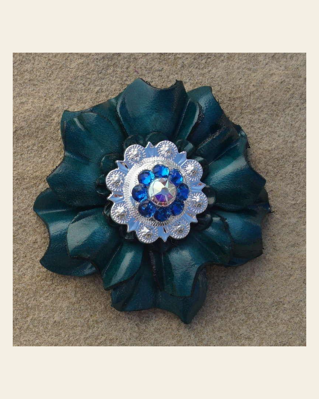 Teal Carnation Flower With Bright Silver Capri and AB 1" Concho on a warm cream background