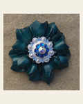 Teal Carnation Flower With Bright Silver Capri and AB 1" Concho on a warm cream background