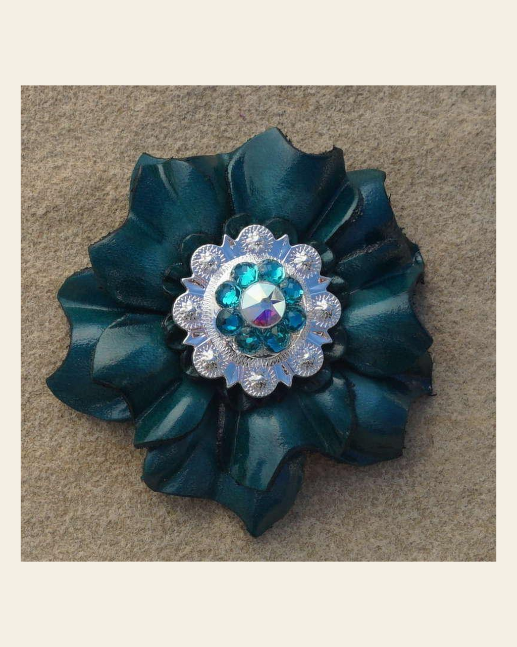 Teal Carnation Flower With Bright Silver Teal and AB 1" Concho on a warm cream background