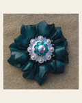Teal Carnation Flower With Bright Silver Teal and AB 1" Concho on a warm cream background