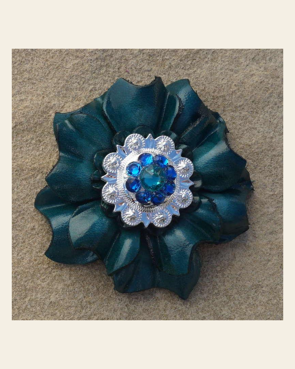 Teal Carnation Flower With Bright Silver Teal and Capri 1" Concho on a warm cream background