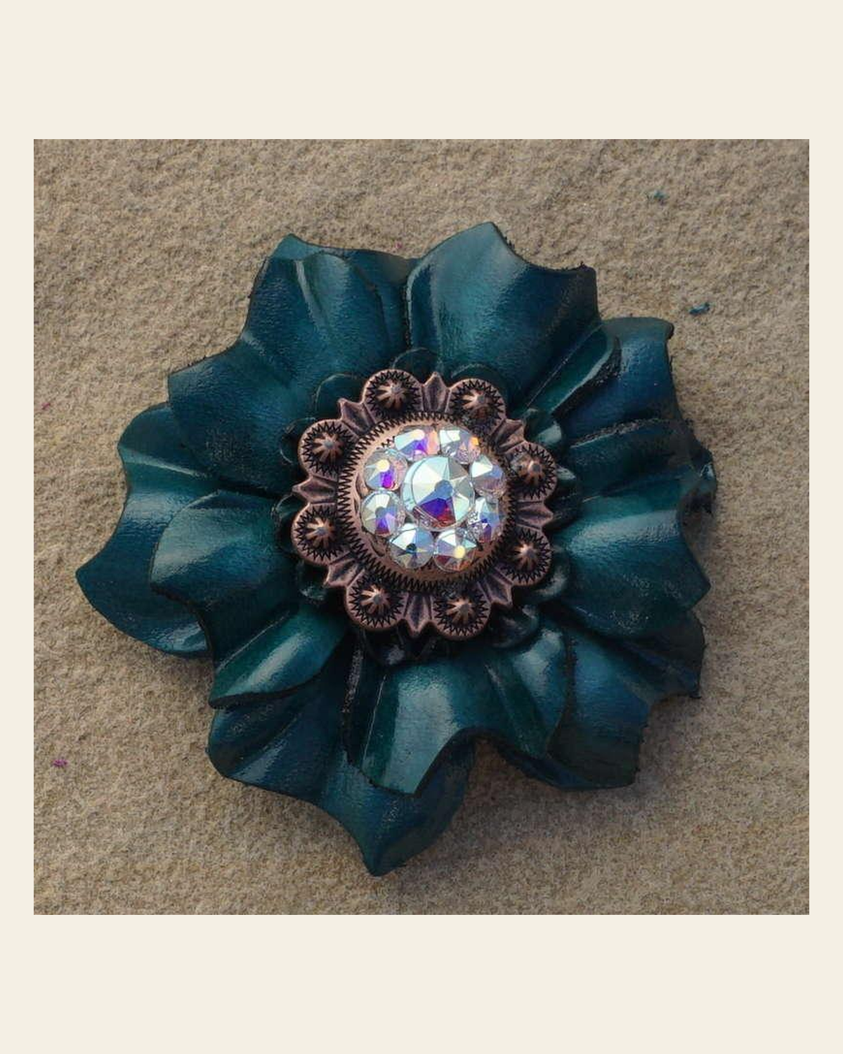 Teal Carnation Flower With Copper AB 1" Concho on a warm cream background