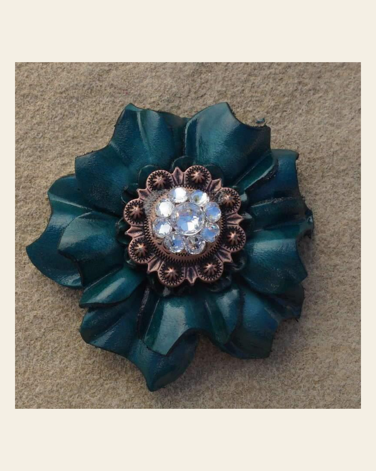Teal Carnation Flower With Copper Clear 1" Concho on a warm cream background