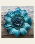Teal Carnation Leather Flower on a warm cream background