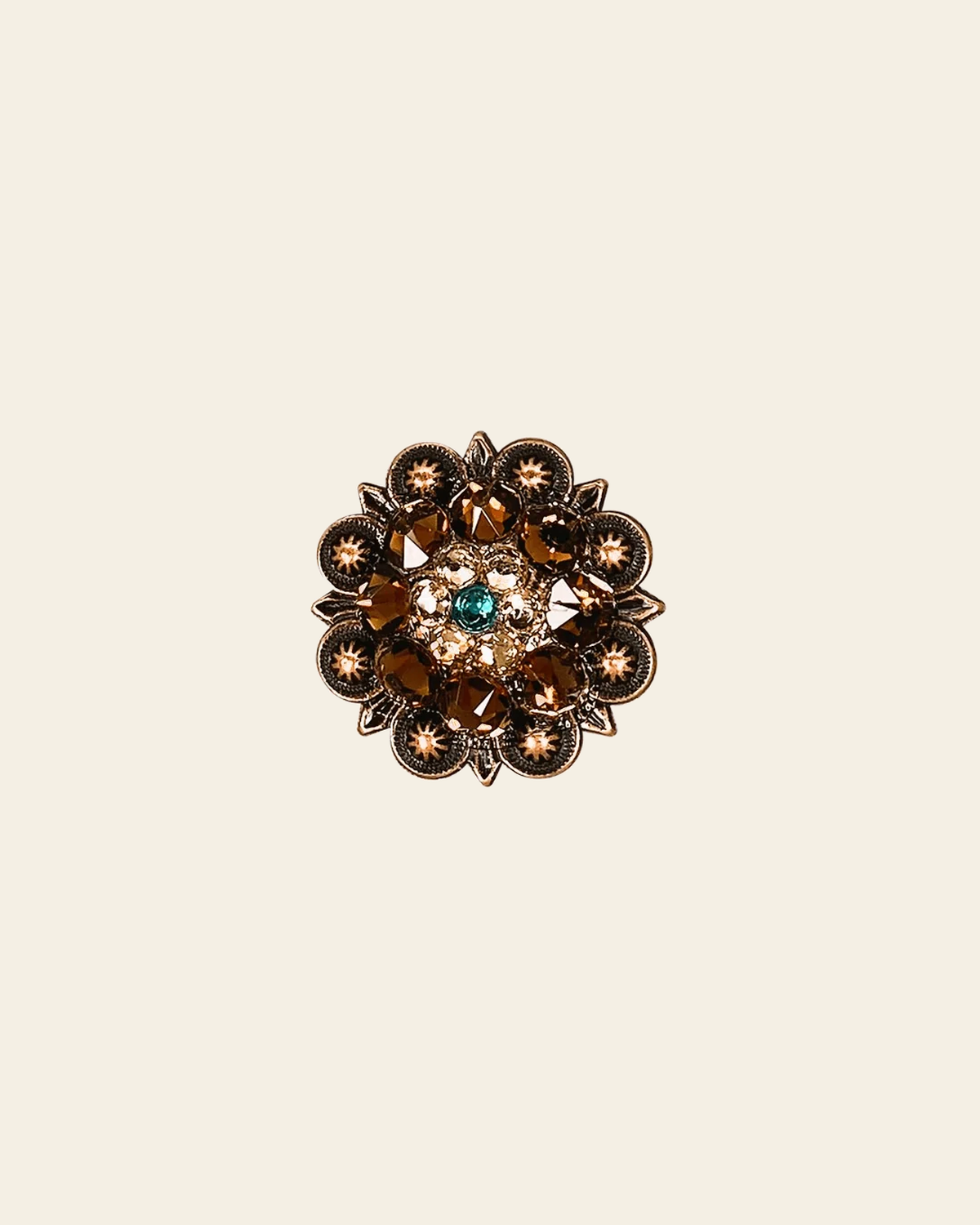 Teal Champagne & Topaz Copper 1.25" European Crystal Concho on a warm cream background