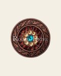 Teal Champagne & Topaz Copper 1.5" Disc European Crystal Concho on a warm cream background
