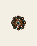Teal Champagne & Topaz Copper 1.5" European Crystal Concho on a warm cream background