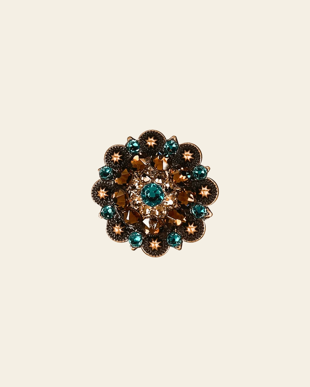 Teal Champagne & Topaz Copper 1.5" European Crystal Concho on a warm cream background
