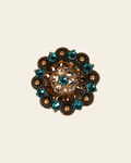 Teal Champagne & Topaz Copper 2" European Crystal Concho on a warm cream background