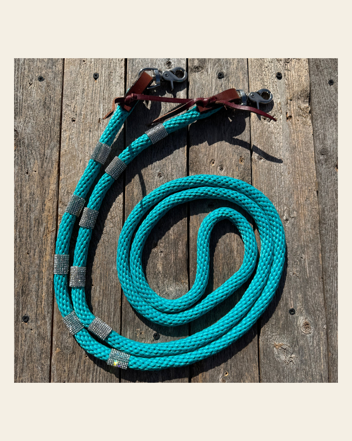 Teal Nylon Barrel Racing Reins with Rhinestones #BNR109 on a warm cream background