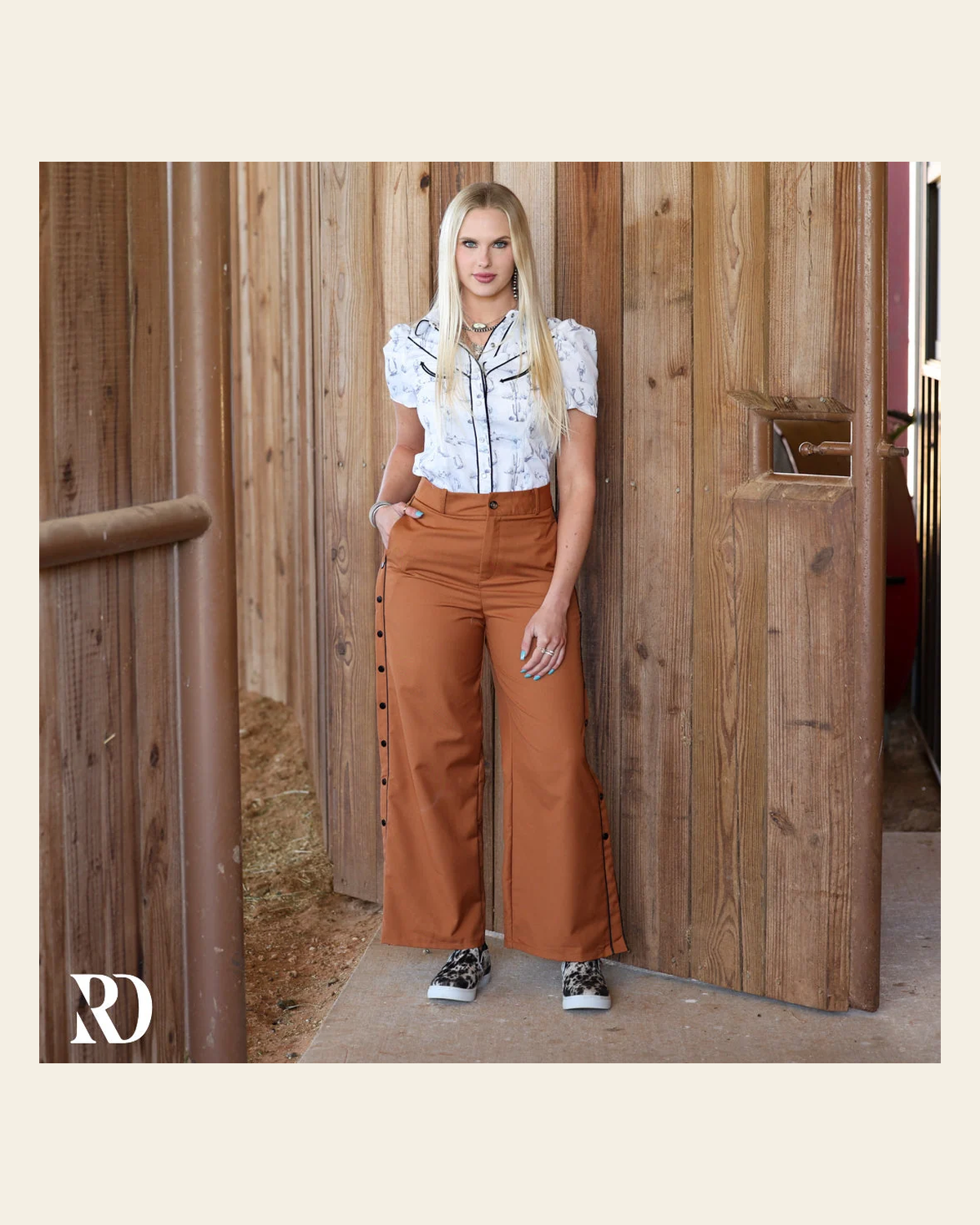 The Corporate Cowgirl | Trousers on a warm cream background