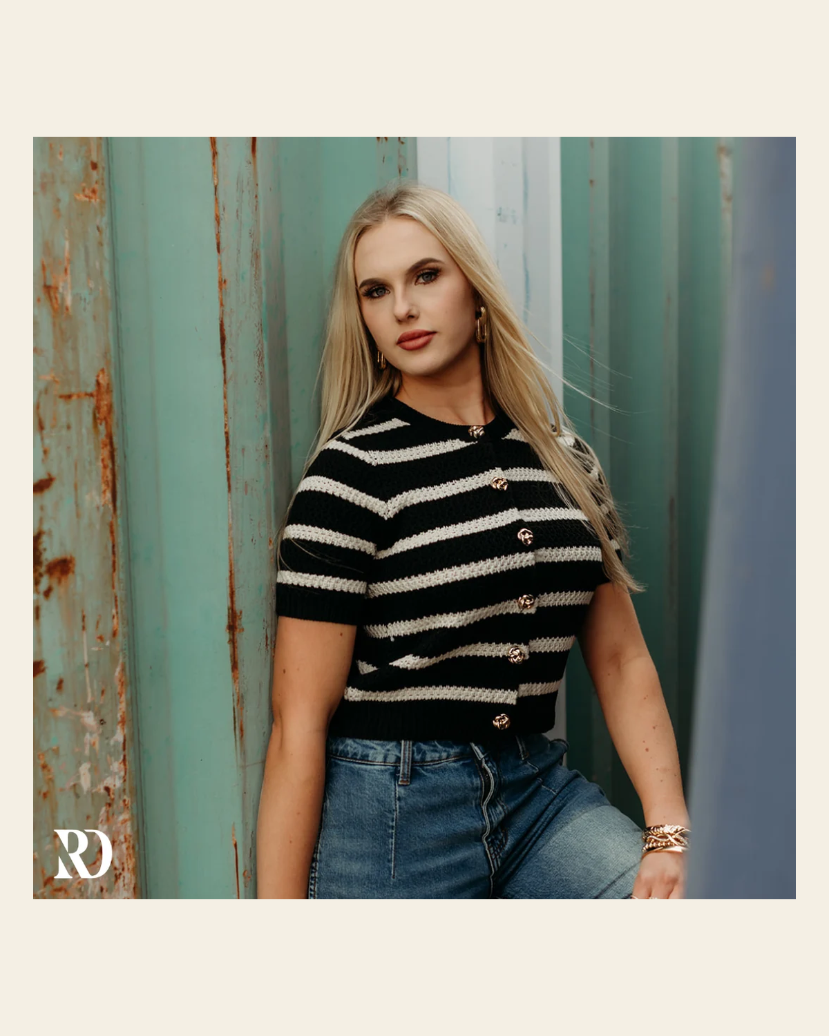 The Uptown Striped Knit | Top on a warm cream background
