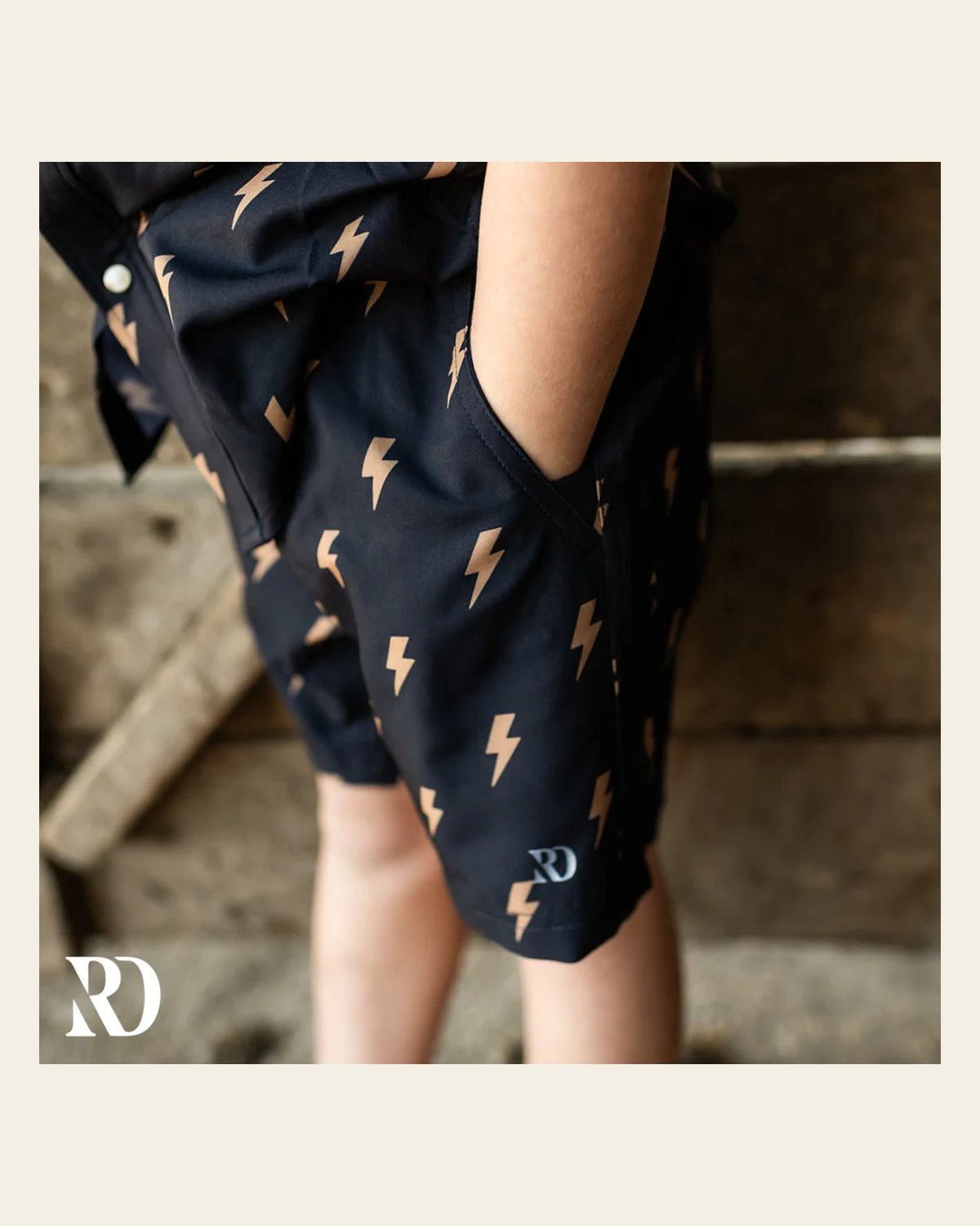 Toddler Shorts | Thunder Bolt on a warm cream background
