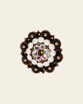 Topaz, AB & Pearl Copper 2" European Crystal Concho on a warm cream background