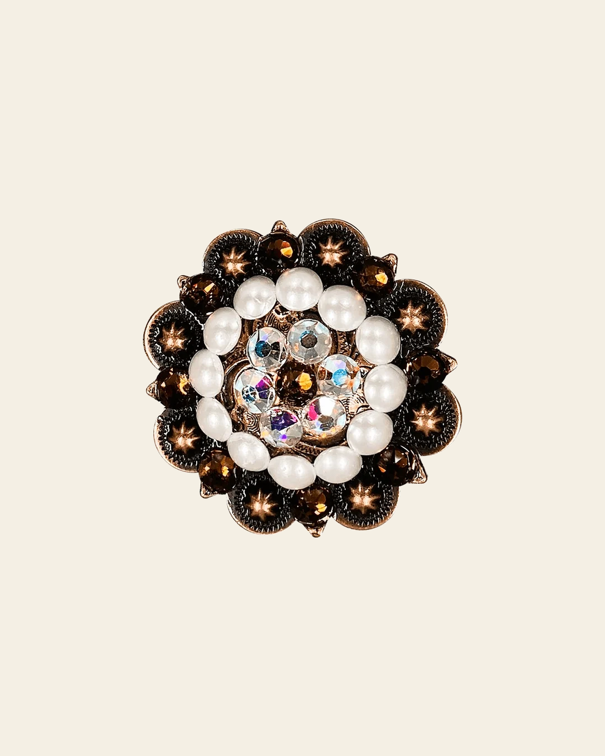 Topaz, AB & Pearl Copper 2" European Crystal Concho on a warm cream background