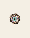 Topaz Turquoise & AB Copper 1.25" European Crystal Concho on a warm cream background