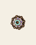 Topaz Turquoise & AB Copper 1.5" European Crystal Concho on a warm cream background