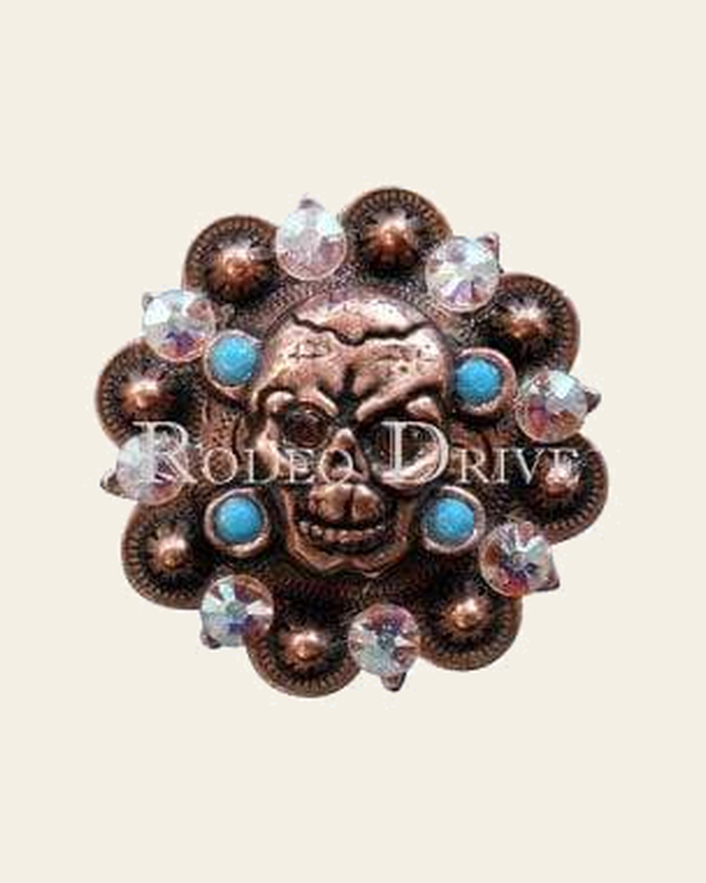 Topaz Turquoise & AB Copper 1.75" Skull European Crystal Concho on a warm cream background