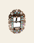 Topaz Turquoise & AB Copper European Crystal Cart Buckle on a warm cream background