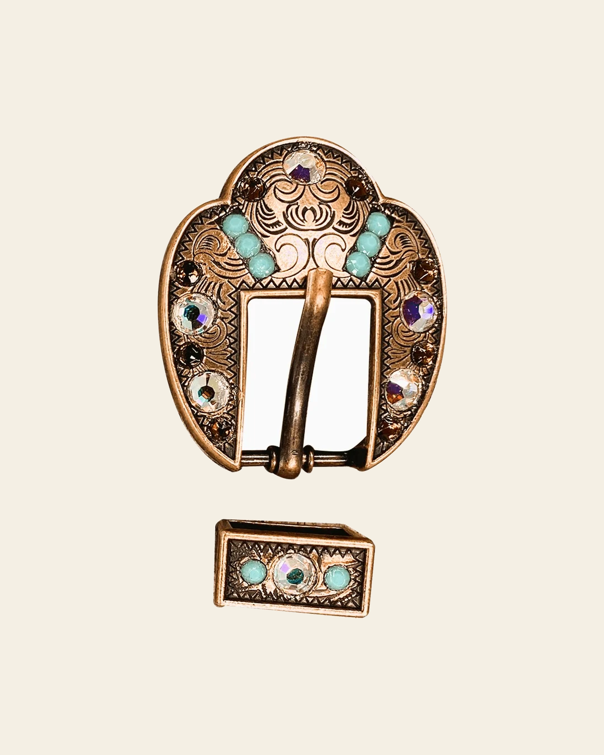 Topaz Turquoise & AB Copper European Crystal Fancy Buckle on a warm cream background