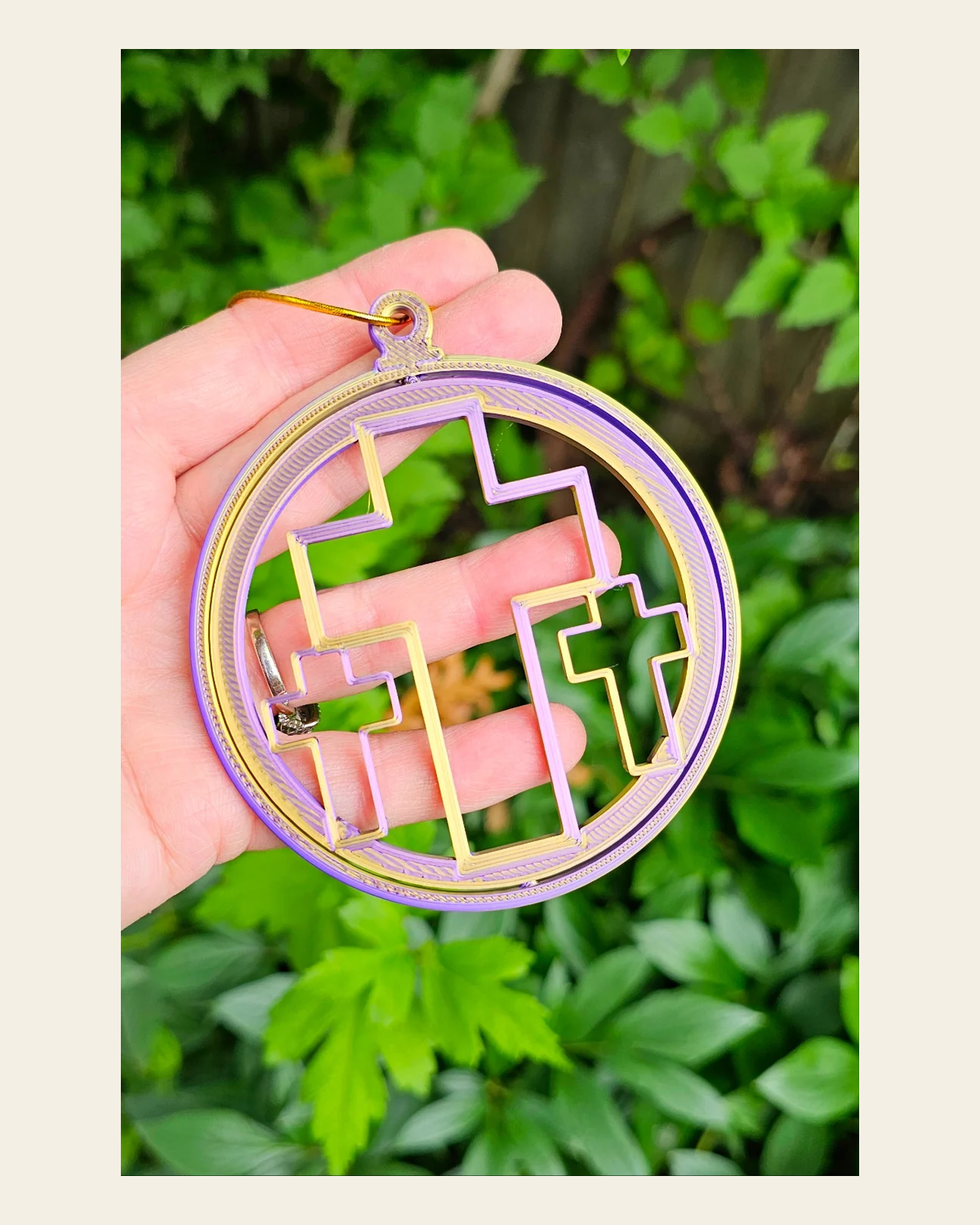 Triple Cross Ornament Medium on a warm cream background