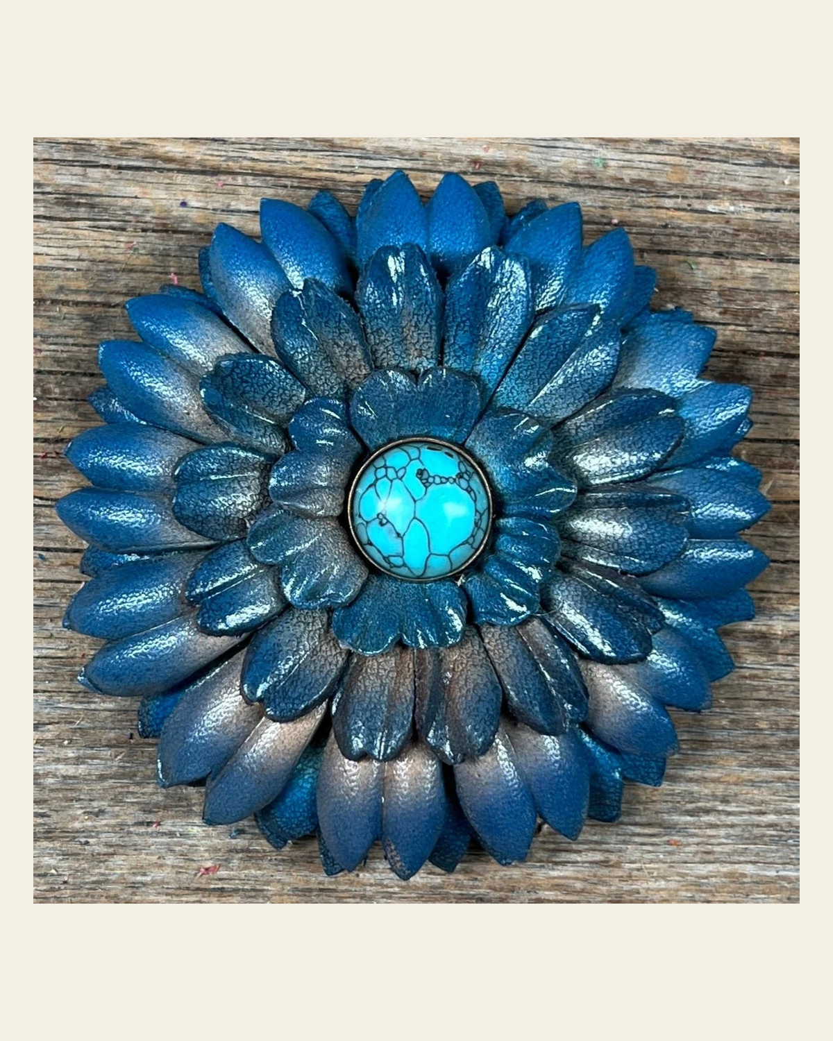 Turquoise Daisy Flower With Round Turquoise on a warm cream background