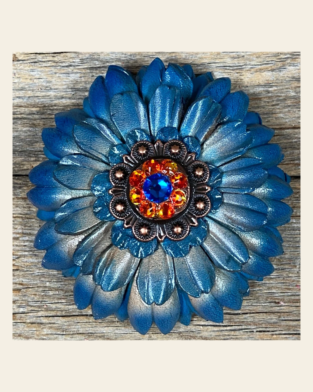 Turquoise Daisy Flower With Copper Capri, Fire Opal 1" Concho on a warm cream background