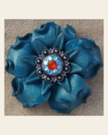 Turquoise Gardenia Flower With Antique Silver Fire Opal and Aqua 1" Concho on a warm cream background