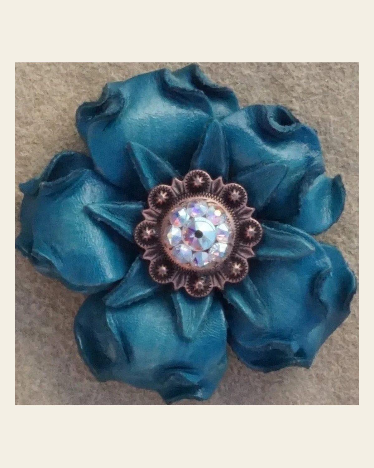 Turquoise Gardenia Flower With Copper AB 1" Concho on a warm cream background