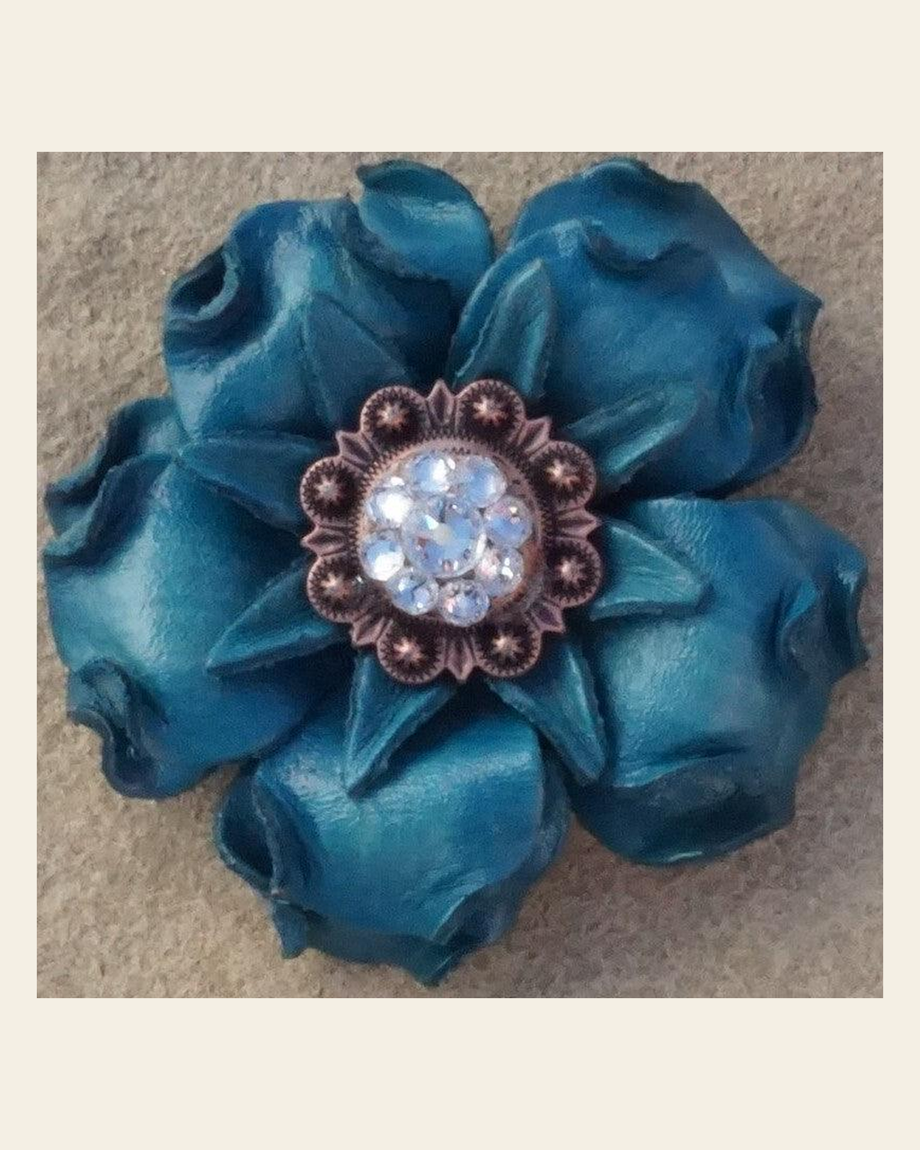 Turquoise Gardenia Flower With Copper Clear 1" Concho on a warm cream background