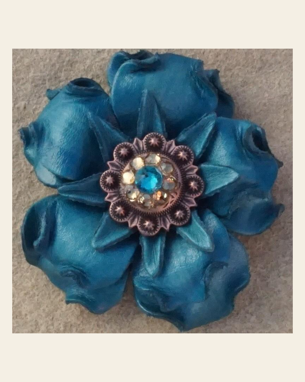 Turquoise Gardenia Flower With Copper Teal & Champagne 1" Concho on a warm cream background