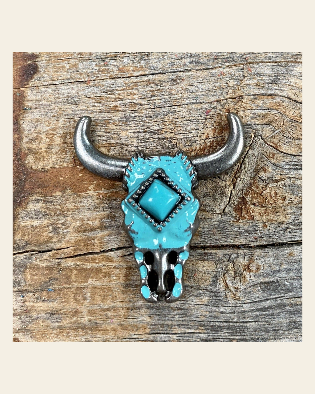 Turquoise Steer Head Concho W202L on a warm cream background