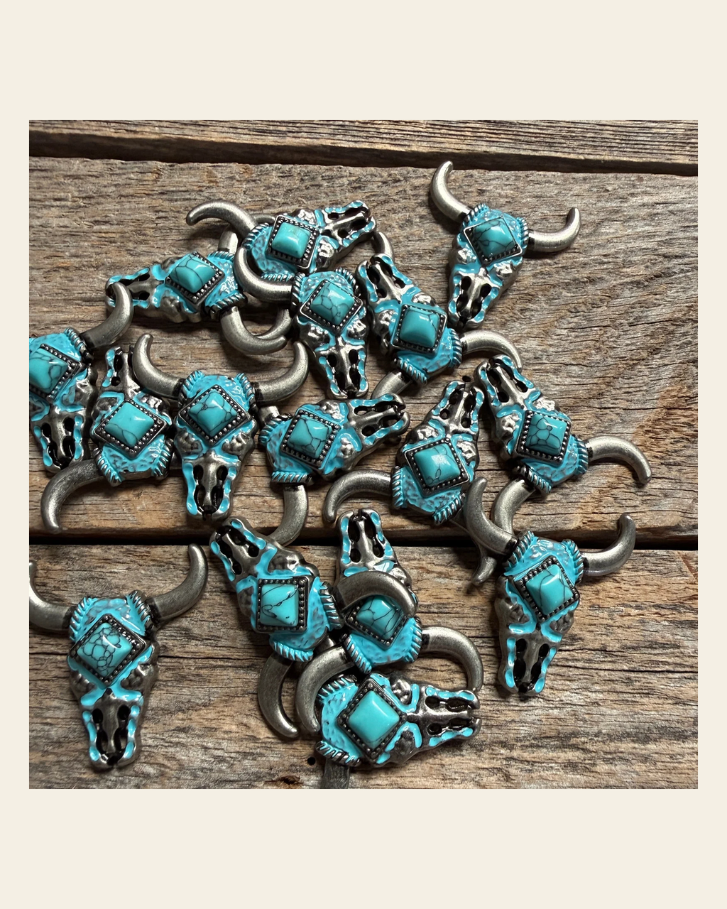 Turquoise Steer Head Western Concho W202 on a warm cream background