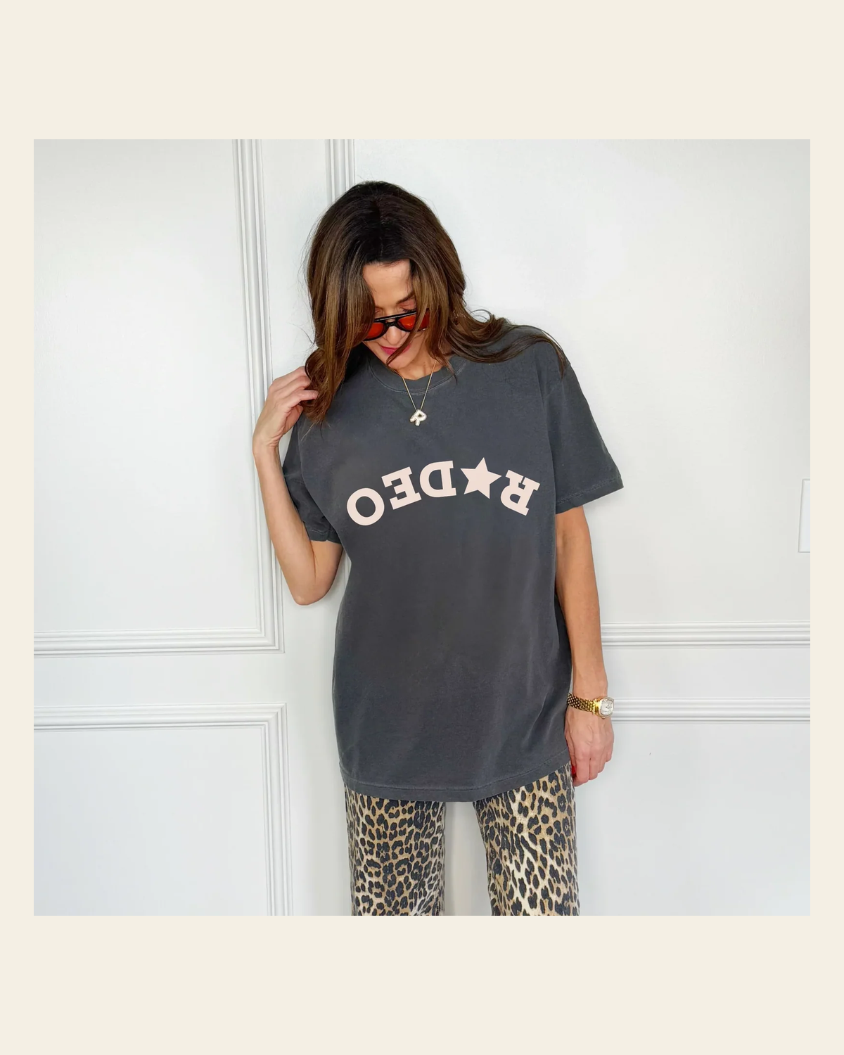 Upside Down Rodeo | Tee on a warm cream background