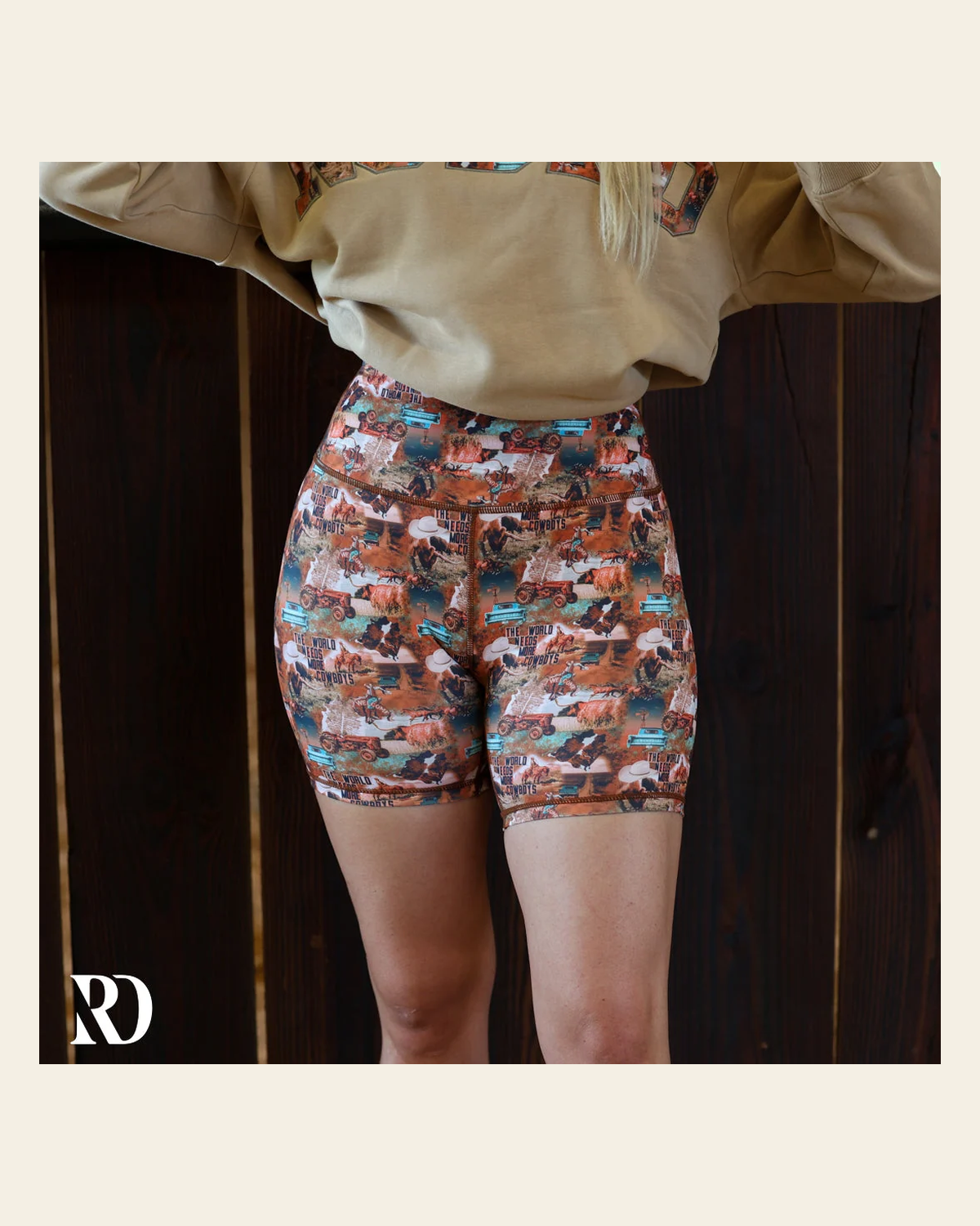 Vital Bike Shorts | World Needs More Cowboys on a warm cream background