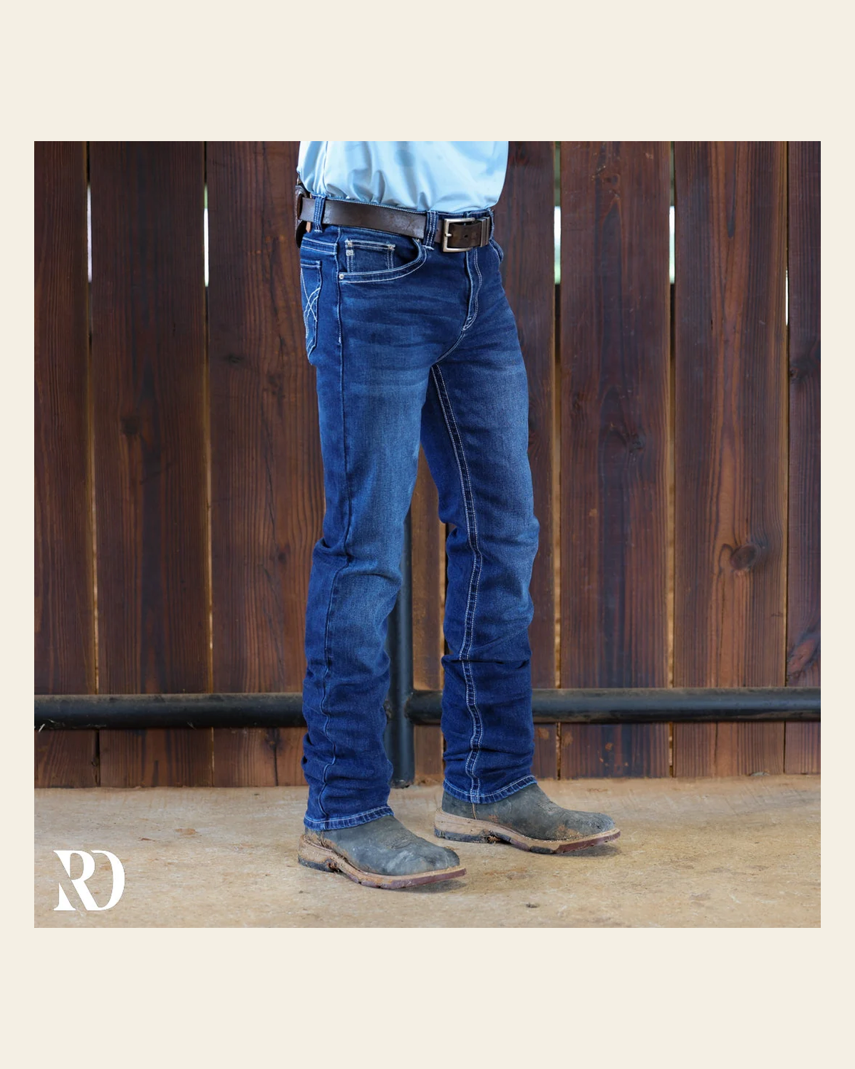 Westbound Signature Slim Straight Denim - Medium Wash on a warm cream background