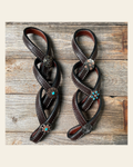 Western Dark Oil Rustic Tie Down Keepers on a warm cream background