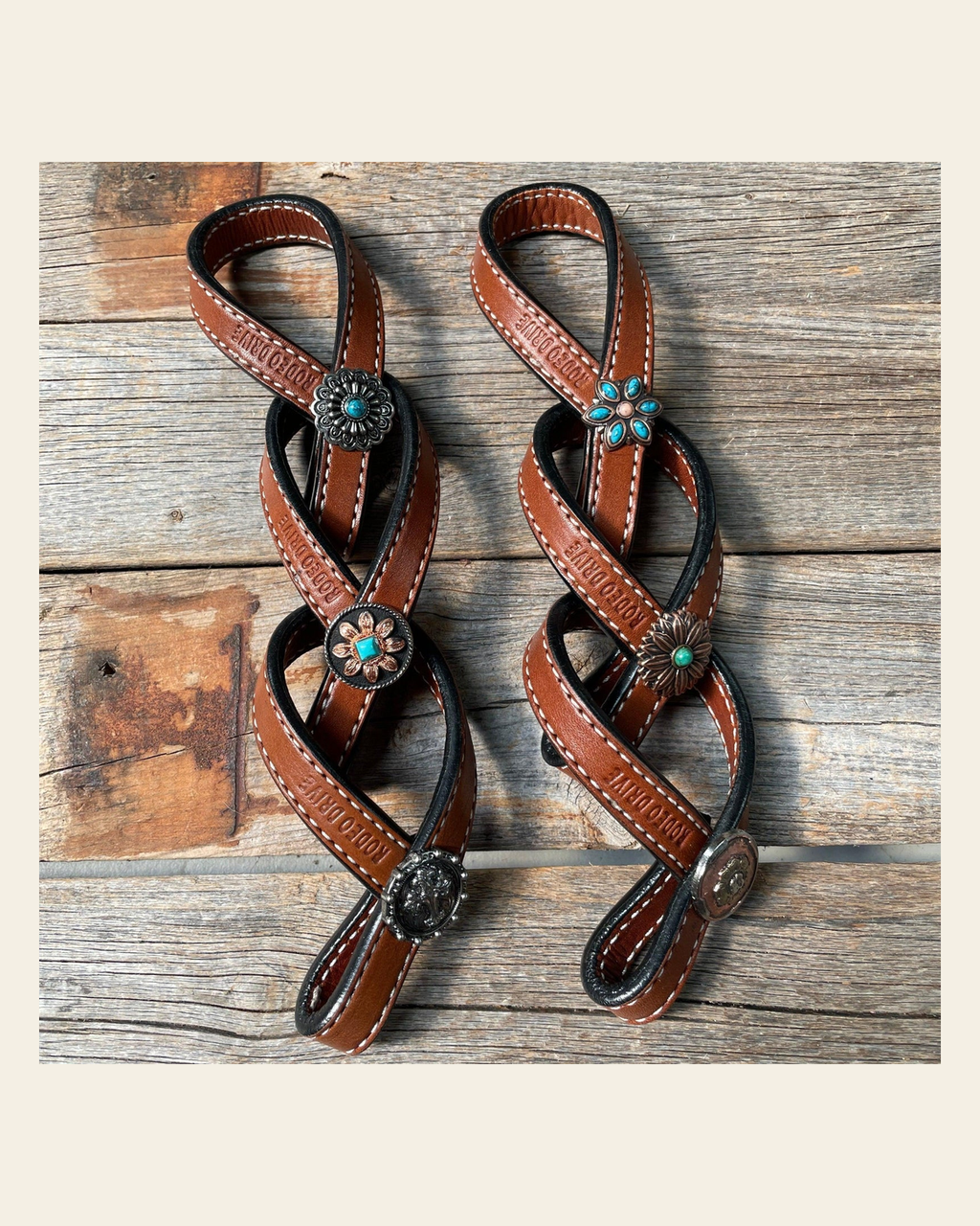 Western Medium Oil Rustic Tie Down Keepers on a warm cream background