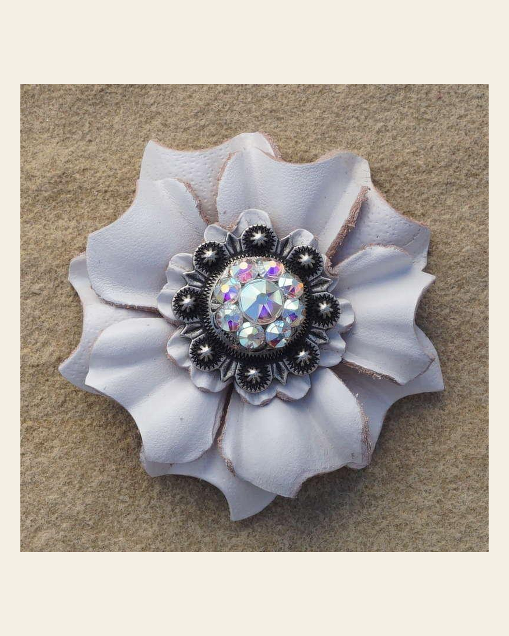 White Carnation Flower With Antique Silver AB 1" Concho on a warm cream background