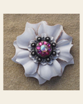 White Carnation Flower With Antique Silver Fuchsia and AB 1" Concho on a warm cream background