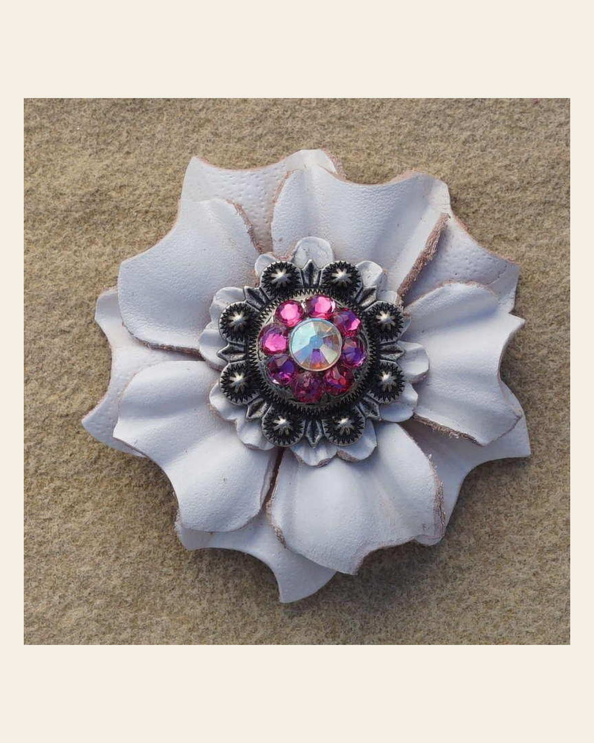 White Carnation Flower With Antique Silver Fuchsia and AB 1" Concho on a warm cream background