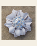 White Carnation Flower With Bright Silver Clear 1" Concho on a warm cream background