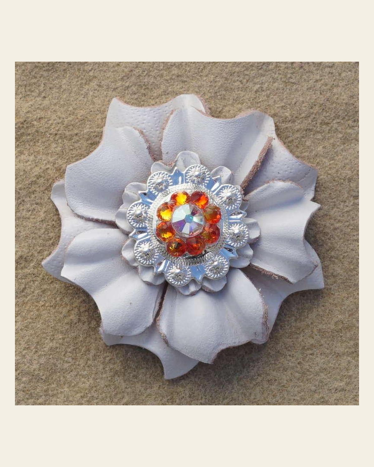 White Carnation Flower With Bright Silver Fire Opal and AB 1" Concho on a warm cream background
