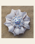 White Carnation Flower With Bright Silver Light Sapphire and AB 1" Concho on a warm cream background